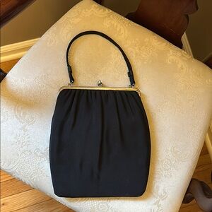 Retro black kiss-lock cloth handbag, 1950s